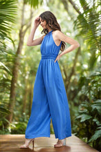 Load image into Gallery viewer, The Above All High Jumpsuit is a sleek and sophisticated fashion staple. Its high neckline adds an element of chic elegance, while the sleeveless design keeps it modern and versatile. Whether you&#39;re dressing up for a formal event or looking for a stylish ensemble for a night out, this jumpsuit offers a timeless and fashionable look that effortlessly combines grace and confidence.
