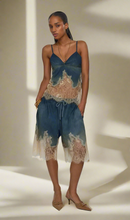 Load image into Gallery viewer, These Celine Lace Patchwork Denim set are expertly crafted with intricate lace detailing, adding a touch of elegance to your wardrobe. Made with high-quality materials, these shorts provide both style and comfort. Perfect for any occasion, these unique pants are a must-have for any fashionista! Pair with heels, and your gold accessories