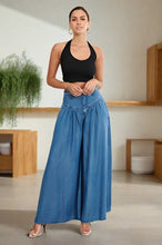 Load image into Gallery viewer, These cute cozy high waisted chambray, wide leg jean pants with a light wash that's perfect for everyday casual looks. Cut from a soft denim jean blend, featuring a front top stitch yoke design, and two front pockets. lightweight high rise slant front pockets. These jeans are stylish enough to wear anywhere.
