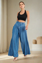 Load image into Gallery viewer, These cute cozy high waisted chambray, wide leg jean pants with a light wash that's perfect for everyday casual looks. Cut from a soft denim jean blend, featuring a front top stitch yoke design, and two front pockets. lightweight high rise slant front pockets. These jeans are stylish enough to wear anywhere.