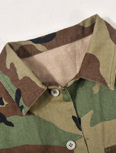 Load image into Gallery viewer, Enhance your look with this Touch Of Flair camouflage top can be dressed up or down depending on your style. Complete the look by pairing this with bralette, tank, or bandeau and our camouflage skirt. Style with your favorite jeans and heels and wear to your next girls' day out.