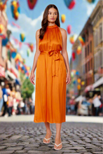 Load image into Gallery viewer, This Summer Lucy Paris dress is made with love for nice sunny days! This is a statement making dress, it has a soft satin feel fabric. Our Lucy Paris sleeveless dress featuring a round neck button collar, with an open back sexy detail, the belt gives it a cute feminine look. You will be sure to turn heads throughout your day at any event. Pair with heels, and your gold accessories.