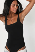 Load image into Gallery viewer, The Essential Bodysuit you never knew you needed is right here! Featuring a very smooth and stretchy material, scoop neckline and a swimsuit like build with a snap closure. Pair this Black bodysuit with any of our favorite Hybrid Dream Jeans, shorts, leggings and more for the look you'll love.