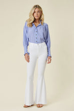 Load image into Gallery viewer, Make a fashion statement in our Vibrant M.i.U High Waisted Flare White Jeans. This jean comes in an extreme flare fit featuring two back patch pockets, faux front pockets, light frayed bottom hem, and a zip-fly closure. Style these jeans with a statement top and a high heel for a look that will have everyone talking.
