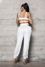 Load image into Gallery viewer, Add some sexy satin feels into your weekend look with this dreamy satin set. This Always In My Prime Two-Piece Satin set featuring soft material with a cross back satin bustier bra the back has an elastic waist band. The pants have a sexy side waist opening and adjustable straps on and elastic or the legs, we're obsessed. Style with the cute clutch, high heels and statement accessories for a look like no other.