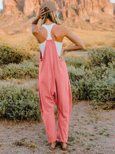 Load image into Gallery viewer, This Sunrise romper features a striking V- neckline, pockets and lots of stretch for added comfort, this full-size sleeveless jumpsuit comes in a variety of colors. Our Sunrise jumpsuit is stylish, comfortable and its lightweight fabric makes it ideal for summer or fall events, such as brunch or a family BBQ. Style with a bag and your favorite sandals for a complete look.