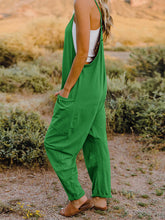 Load image into Gallery viewer, This Sunrise jumpsuit features a striking V- neckline, pockets and lots of stretch for added comfort, this full-size sleeveless jumpsuit comes in a variety of colors. Our Sunrise jumpsuit is stylish, comfortable and its lightweight fabric makes it ideal for summer or fall events, such as brunch or a family BBQ. Style with a bag and your favorite sandals for a complete look.