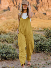 Load image into Gallery viewer, This Sunrise romper features a striking V- neckline, pockets and lots of stretch for added comfort, this full-size sleeveless jumpsuit comes in a variety of colors. Our Sunrise jumpsuit is stylish, comfortable and its lightweight fabric makes it ideal for summer or fall events, such as brunch or a family BBQ. Style with a bag and your favorite sandals for a complete look.