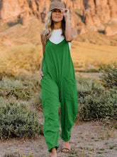 Load image into Gallery viewer, This Sunrise jumpsuit features a striking V- neckline, pockets and lots of stretch for added comfort, this full-size sleeveless jumpsuit comes in a variety of colors. Our Sunrise jumpsuit is stylish, comfortable and its lightweight fabric makes it ideal for summer or fall events, such as brunch or a family BBQ. Style with a bag and your favorite sandals for a complete look.
