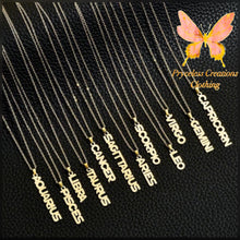 Load image into Gallery viewer, This necklace is perfect for any outfit, you can also layer it with your favorite necklaces to create a unique style! Each sign of the Zodiac has its own symbol and a Cubic Zirconia finish for the constellation. You'll have heads turning, living glam, and feeling iconic with this vertical design.