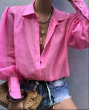 Load image into Gallery viewer, We're loving this sexy white classy blouse for this summer season! It makes a great essential to have in your closet. This super cute low V-neckline, puff sleeves with puff shoulder detailing. Pair with a stylish pair of high rise jeans, high heels and handbag for an elevated casual look. Whether you're headed to the office or to dinner.