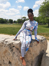 Load image into Gallery viewer, Our gray bad ting two piece yoga set is made with colorful seamless fabrics that are soft and stretch effortlessly with your movements, easy to pull-on and very comfortable to wear. Yoga set comes with a long sleeve crop top with thumb holes, leggings with a elastic waist band drawstring detail. Pair this cute yoga set with some sneakers and yoga mat.