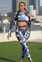 Load image into Gallery viewer, Our black bad ting two piece yoga set is made with colorful seamless fabrics that are soft and stretch effortlessly with your movements, easy to pull-on and very comfortable to wear. Yoga set comes with a long sleeve crop top with thumb holes, leggings with a elastic waist band drawstring detail. Pair this cute yoga set with some sneakers and yoga mat.