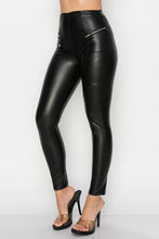 Load image into Gallery viewer, Obsessed is an understatement when it comes to these vegan leather leggings. This is surely a piece for your closet! Material that allows great stretch this pant sculpts your body in all the right places. These trendy pants are skinny fit, high rise waistband and front zipper detailing. Pair with a sexy bodysuit and high heels to give your look an edgy but stylish finish to complete your look.