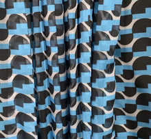 Load image into Gallery viewer, This dress is everything babe! From the vibrant color blue wave pattern. We're literally obsessed with this dress! This gorgeous sheer statement dress has a mini lining underneath. Featuring a round crewneck line, back button closure, sheer material, cut out side design. You can pair it with a red or transparent high heels and mini bag for a standout look that'll have all eyes on you!