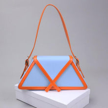 Load image into Gallery viewer, Accent with its geometric shape with contrast piping detailing, this luxury shoulder bag finishes a unique sophisticated look. It also features a fold-over flap top with a hidden magnetic fastening, an adjustable shoulder strap, and cut from PU leather fabric. Pair it with your favorite essentials for a chic look. Our designer bags collection also brings out a range of shoulder bags for women. Keep scrolling for the best styles.