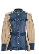 Load image into Gallery viewer, This bold statement-making denim jacket belongs in your closet this season! We're in love with this sexy and sophisticated jacket features round neck collar with raw cut details. soft tan fabric, accent brown buttons at the top shoulders, long sleeves along. This jacket is easy to style and made of very lightweight material. Pair this with tan faux leather pants or jeans, a fabulous top and stylish heels, for any of your favorite fall looks!