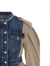 Load image into Gallery viewer, This bold statement-making denim jacket belongs in your closet this season! We're in love with this sexy and sophisticated jacket features round neck collar with raw cut details. soft beige fabric, accent brown buttons at the top shoulders, long sleeves along. This jacket is easy to style and made of very lightweight material. Pair this with tan faux leather pants or jeans, a fabulous top and stylish heels, for any of your favorite fall looks!