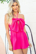 Load image into Gallery viewer, Be sure to stand out in sweeter than ever romper wherever you go from day to night in style! Featuring shapes, a strapless neckline, halter necktie, elastic at the back and a cut out front, textured woven fabric and princess bow. Totally on-trend, tie-front detail accents this chic romper perfectly while pleated shorts complete the look! Hidden back zipper/clasp.