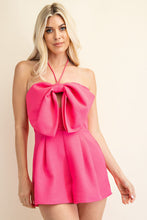 Load image into Gallery viewer, Be sure to stand out in sweeter than ever romper wherever you go from day to night in style! Featuring shapes, a strapless neckline, halter necktie, elastic at the back and a cut out front, textured woven fabric and princess bow. Totally on-trend, tie-front detail accents this chic romper perfectly while pleated shorts complete the look! Hidden back zipper/clasp.