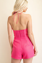 Load image into Gallery viewer, Be sure to stand out in sweeter than ever romper wherever you go from day to night in style! Featuring shapes, a strapless neckline, halter necktie, elastic at the back and a cut out front, textured woven fabric and princess bow. Totally on-trend, tie-front detail accents this chic romper perfectly while pleated shorts complete the look! Hidden back zipper/clasp.