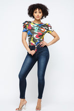 Load image into Gallery viewer, This cute and casual top can be dressed up or down depending on your mood. Complete the look by pairing the alpha camo crop top with jeans, a denim jacket, and white sneakers.