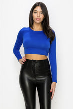 Load image into Gallery viewer, Keep it casual and chic with our crop top that is essential to your layered outfits! The top features a crew neck, long sleeves, and a cropped hem. Featuring a knit fabric that offers a form-hugging fit with a moderate stretch. Complete look with our Hybrid Dream Jeans and some transparent high heels.