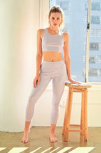 Load image into Gallery viewer, Love is in the air with this fun and flirty lilac activewear set! This top is detailed with Lilac Shine Twinkle Foil. This set is particularly designed for yoga and exercising. You will feel confident and comfortable while your working out or running errands. Pair with your favorite cute white sneakers for a complete look!