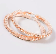 Load image into Gallery viewer, Add some sparkle and shine with these beautifully detailed champagne crystal hoop earrings. Featuring jeweled detailing on rose gold-tone setting, these earrings are perfect for all occasions.