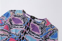 Load image into Gallery viewer, Colorful Jungle Jumpsuit - Multi Color Get ready to flaunt your flawless summer body in this colorful sexy jumpsuit! The lace up detail and front cut out will give you a flattering silhouette and ultra sexy look. Wear this snake skin jumpsuit with your favorite heels, golden hoops and handbag for an edgy glam look.