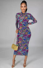 Load image into Gallery viewer, Slip into this super sexy dress for your next night out with the girls or date night! This dress hugs your body in all the right places. This sexy snake print long bodycon dress is versatile you can wear the zipper in the front or back. Style this dress with a black high heel and clutch for a complete look.
