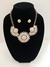 Load image into Gallery viewer, This flawless creamy necklace set is a dream, with glistening crystals on this statement necklace design. Not only will it give you the party look you desire, but also make it simple to transition from summer to fall and even winter.

