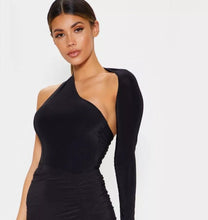 Load image into Gallery viewer, We're bringing you the ultimate crossover bodysuit! Perfect for building your favorite looks all year round. This bodysuit comes in a luxurious milky smooth soft fabric it is also wrinkle free. Our sexy crossover bodysuit featuring a sexy neckline, cut out back and snap seat closure. Made of materials that allow great stretch and breathable fabric. Style it with a blazer and jeans or one of our sexy pleated skirts matching high waist legging and heels to create a casual-chic look.