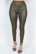 Load image into Gallery viewer, Obsessed is an understatement when it comes to these Faux leather leggings. This is surely a piece for your closet! Material that allows great stretch this pant sculpts your body in all the right places. These trendy pants are skinny fit and elasticized waistband. Pair with a statement knitted top and high heels to give your look an edgy but stylish finish to complete your look.