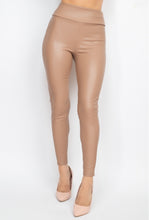 Load image into Gallery viewer, Obsessed is an understatement when it comes to these Faux leather leggings. This is surely a piece for your closet! Material that allows great stretch this pant sculpts your body in all the right places. These trendy pants are skinny fit and elasticized waistband. Pair with a statement knitted top and high heels to give your look an edgy but stylish finish to complete your look.
