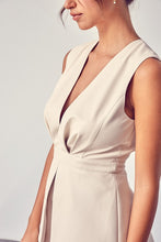 Load image into Gallery viewer, Get ready to make a statement in this romper babe! Whether you're going to an event or a night on the town, you're sure to turn heads. This vegan leather romper features include a deep V- Neckline, sexy open back, detail zipper closure for a cinched waist. Pair with a cute high heel or bootie for a complete look.