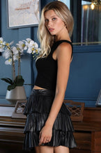 Load image into Gallery viewer, Our enticed by your lust leather mini skirt is sure to give your look a fiercely feminine finish. Featuring a faux leather material, a pleated three-layer ruffle hem and elasticated waistband, team it with a bodysuit or fitted top and heels for a look we&#39;re loving.
