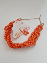 Load image into Gallery viewer, Gorgeous multi strand bubble necklace is fun and peachy. Features seven strands of pop color beads with a pair of earrings. Not only will it give you the party look you desire, but also make it simple outfit look flawless.