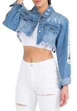 Load image into Gallery viewer, Update your denim collection with our cropped jacket we are obsessing over. Featuring a mid wash denim material with a raw edge and a cropped length, double up your denim with our matching mid-wash jeans and a nude crop top for a combo that can be dressed up or down.
