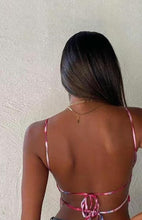 Load image into Gallery viewer, This satin tie die festival top is sure to take your weekend look that extra mile. Featuring a pink, white and baby blue material with a backless design and thin strap detailing, cowl neckline and a cropped length. Style with blue jeans and high heels for a date night with the bae.