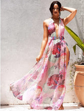 Load image into Gallery viewer, Hot and Sexy Floral Fiona Maxi Dress will have you standing out in the crowd! It has a cut out side making the dress stylish and sexy, while the belt adds a flirty touch the dress also has a bodysuit attached. This dress is great for multiple occasions. You can pair this dress with gold accessories an pair of clear or pink heels and a cute clutch purse to complete your look!