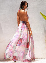 Load image into Gallery viewer, Hot and Sexy Floral Fiona Maxi Dress will have you standing out in the crowd! It has a cut out side making the dress stylish and sexy, while the belt adds a flirty touch the dress also has a bodysuit attached. This dress is great for multiple occasions. You can pair this dress with gold accessories an pair of clear or pink heels and a cute clutch purse to complete your look!