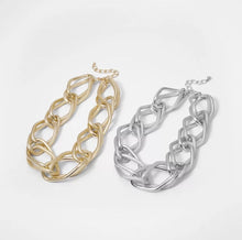 Load image into Gallery viewer, Golden Chain Choker Necklace Make a bold accessory statement with this thick gold chain necklace. This necklace featuring a thick chain detail and clasp closure. Dress it up or down, our jewelry collection is filled with pieces that add instant polish.
