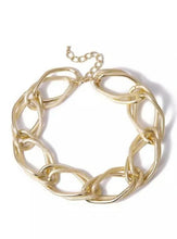 Load image into Gallery viewer, Golden Chain Choker Necklace Make a bold accessory statement with this thick gold chain necklace. This necklace featuring a thick chain detail and clasp closure. Dress it up or down, our jewelry collection is filled with pieces that add instant polish.