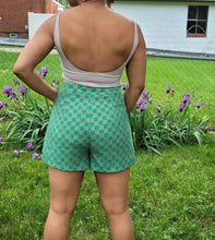 Load image into Gallery viewer, Add some style to your wardrobe with these lightweight, high-waisted shorts. Our Make it Official Shorts feature a checkerboard pattern design, two front pockets. The flow shorts are perfect for a day party, paired with a statement necklace and heels.