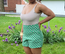 Load image into Gallery viewer, Add some style to your wardrobe with these lightweight, high-waisted shorts. Our Make it Official Shorts feature a checkerboard pattern design, two front pockets. The flow shorts are perfect for a day party, paired with a statement necklace and heels.