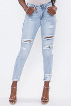 Load image into Gallery viewer, If you don't have this closet essential, you are missing out! These high rise, distressed denim medium wash, skinny jeans are a must have! They feature two back, two front pockets and a front zipper and button to close, distressed details to have you styling at the top of your game. We love pairing our denim distressed jeans with heels for a classier look or with some booties to bring some edge!