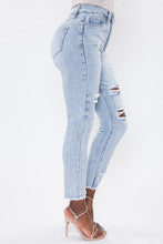 Load image into Gallery viewer, If you don't have this closet essential, you are missing out! These high rise, distressed denim medium wash, skinny jeans are a must have! They feature two back, two front pockets and a front zipper and button to close, distressed details to have you styling at the top of your game. We love pairing our denim distressed jeans with heels for a classier look or with some booties to bring some edge!