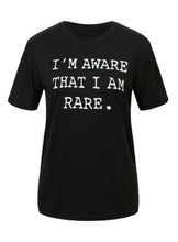 Load image into Gallery viewer, This is a must in your wardrobe! Our I&#39;m Aware That I&#39;m Rare Top has plenty of confidence and is a statement piece. Has a crew neck, short sleeves, loose fitting and soft fabric. Style it with your favorite jeans and high heels for an elevated casual look.
