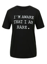 Load image into Gallery viewer, This is a must in your wardrobe! Our I'm Aware That I'm Rare Top has plenty of confidence and is a statement piece. Has a crew neck, short sleeves, loose fitting and soft fabric. Style it with your favorite jeans and high heels for an elevated casual look.